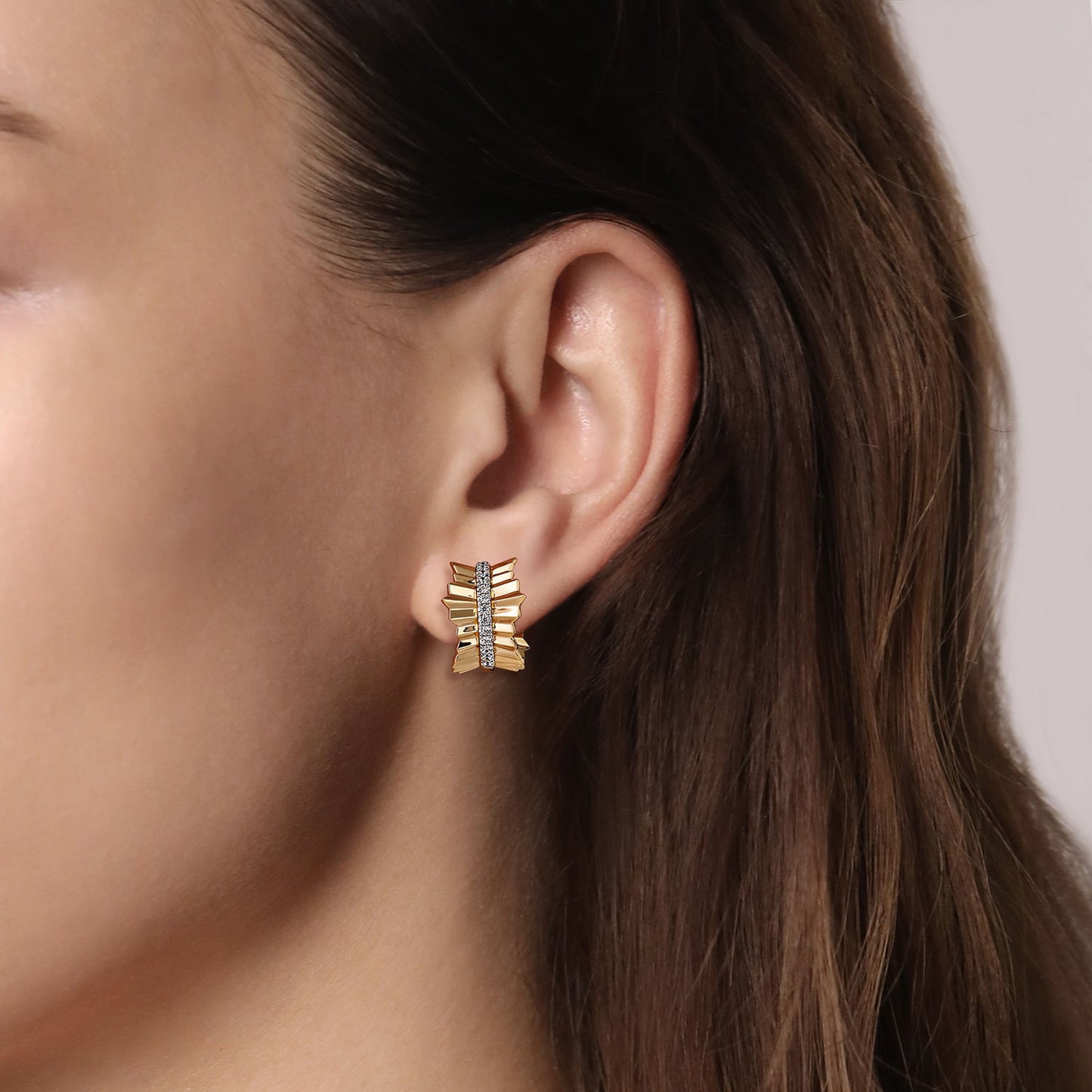 14K Yellow Gold Diamond Huggie in size 15mm with Diamond Cut Texture